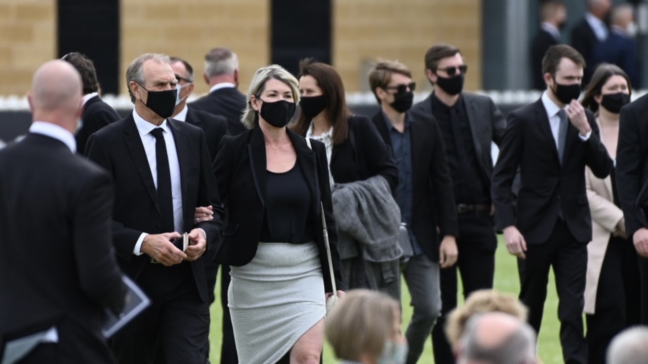 Graham and Nicole Cornes arrive at the funeral. Picture: Naomi Jellicoe