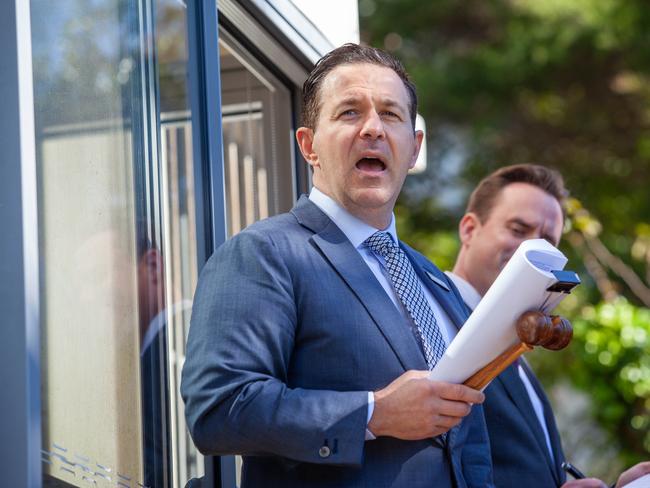 Adrian Bo during an auction in Coogee. Picture: Jordan Shields