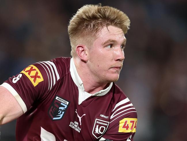 SYDNEY, AUSTRALIA - JUNE 05: Tom Dearden of the Maroons runs the ball during game one of the 2024 Men's State of Origin Series between New South Wales Blues and Queensland Maroons at Accor Stadium on June 05, 2024 in Sydney, Australia. (Photo by Matt King/Getty Images)