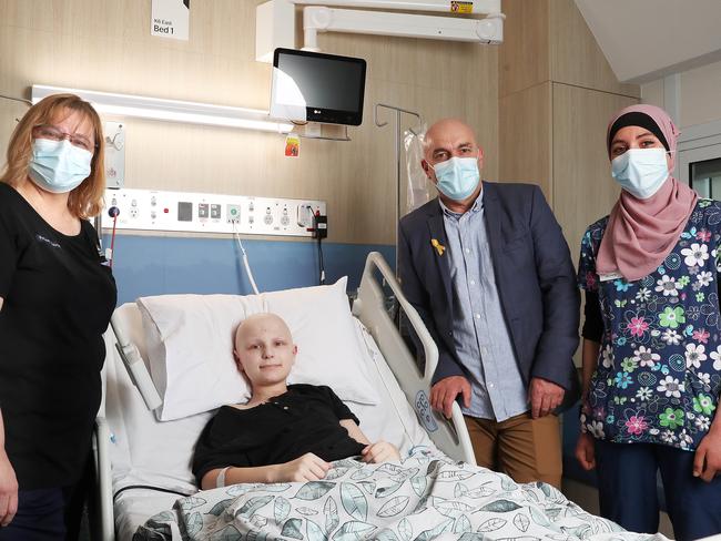 Meriem Daoui, right, patient Harrison Clayton, nurse Helen Starosta and cancer fundraiser Tim Blair at the Royal Hobart Hospital. Picture: Nikki Davis-Jones