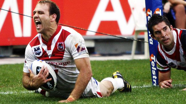 Jason Nightingale scores a try during St George Illawarra’s 2010 grand final win.
