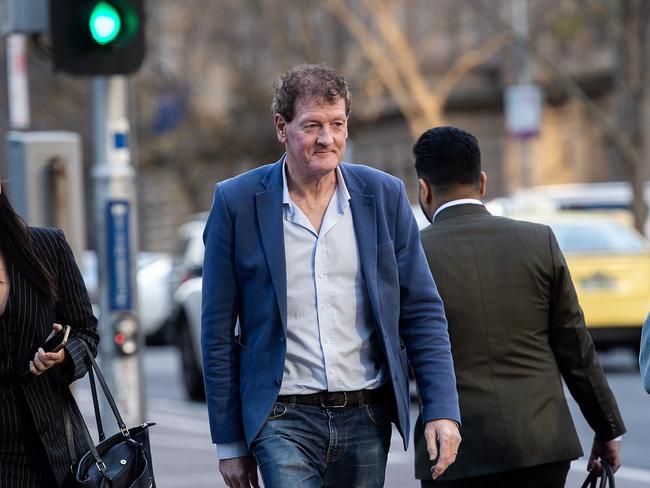 MELBOURNE AUSTRALIA - Newswire Photos JUNE 27TH 2024 : Former AFL player agent Ricky Nixon arrives at Melbourne Magistrates Court, in relation to charges for allegedly selling fake memorabilia - footballs he claimed were signed by Demons players after their premiership win. PICTURE : Newswire / Nicki Connolly