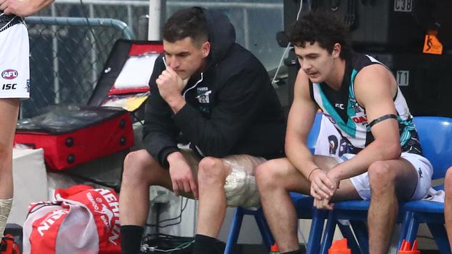 Tom Rockliff finished the match on the bench with a hamstring injury. Picture: Getty Images