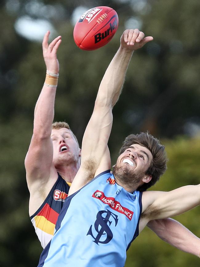 Reilly O'Brien rucks against Sturt’s Thomas Read in the SANFL. Picture Sarah Reed