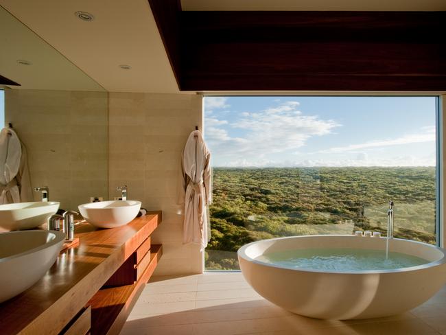 bathtub overlooking mountains