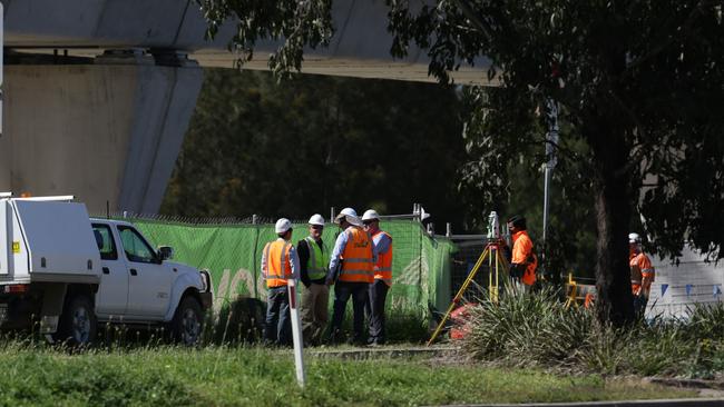 Workers at the Sydney Metro North West rail link construction site on Windsor Rd, Kellyville.