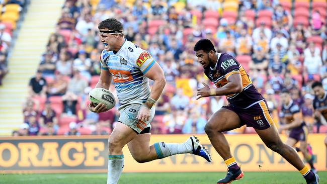 Jarrod Wallace of the Titans gets into space during the Round 13 NRL match between the Brisbane Broncos and the Gold Coast Titans at Suncorp Stadium in Brisbane, Sunday, June 9, 2019. (AAP Image/Dave Hunt) NO ARCHIVING, EDITORIAL USE ONLY