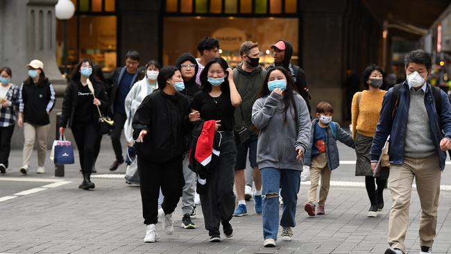 People seen wearing face masks in the Sydney CBD on August 15. Picture: NCA NewsWire/Joel Carrett