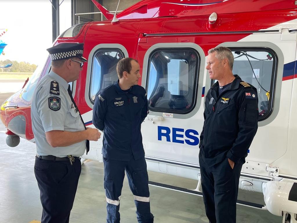 Queensland Police Acting Chief Superintendent Andrew Pilotto with QG Air's Darren O'Brien and Patrick Gillespie. Picture: Matt Johnston