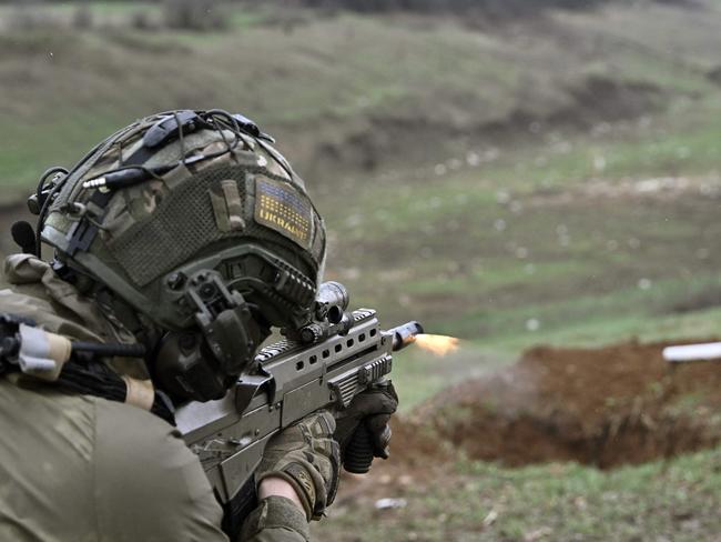 A Ukrainian Special Forces serviceman with Ukrainian made Malyuk assault rifle. Picture: AFP