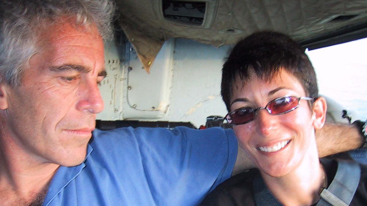 British socialite Ghislaine Maxwell and US financier Jeffrey Epstein. (Photo by Handout / US District Court for the Southern District of New York / AFP)