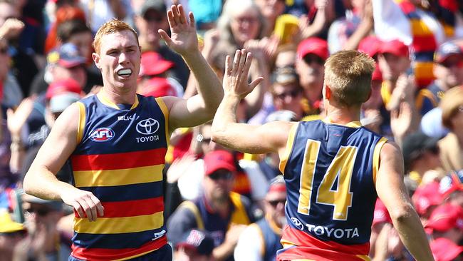 Adelaide Crows’ Tom Lynch Celebrates a goal with David McKay. Picture: Sarah Reed.