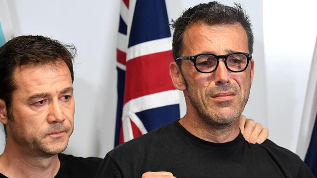 Missing Belgium backpacker Theo Hayez's father Laurent Hayez (right) talks at a press conference at Tweed Heads flanked by Theo's godfather Jean-Phillippe Pector.