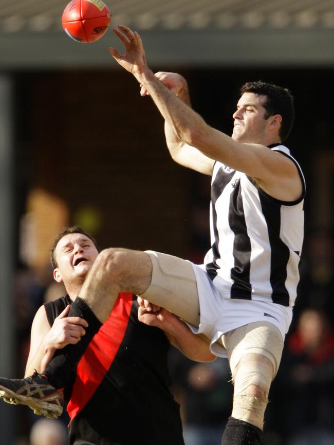 Daniel King wins a ruck tap over Eltham’s Luke McCreery.