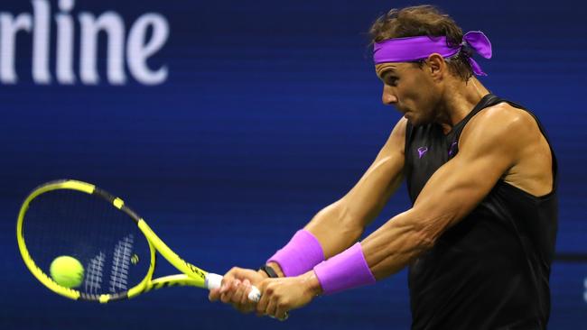 Rafael Nadal pounds a backhand against John Millman. Picture: Getty Images