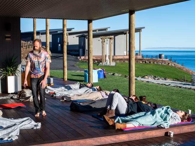 Guests at the Wild Wellness Method Retreat participate in a breath work session guided by Wim Hof instructor Piet Blokker. Picture: Chris Crerar.