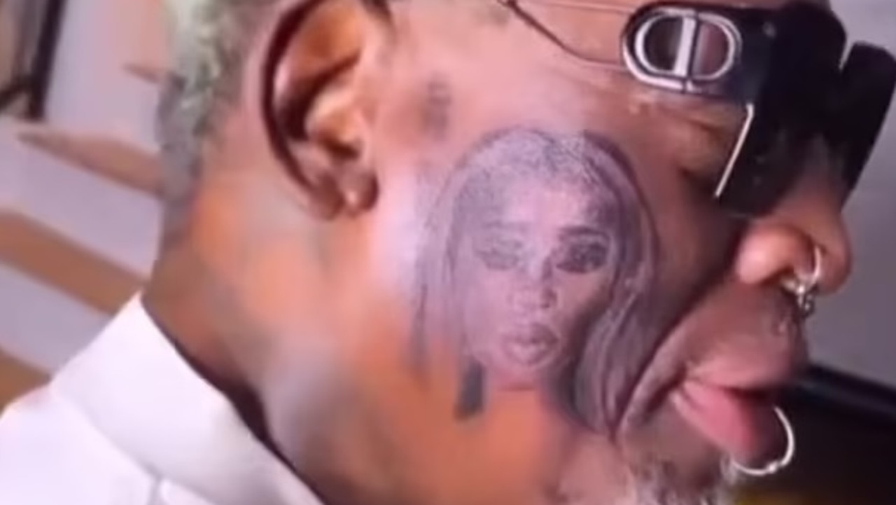 Dennis Rodman Tattoos Girlfriend's Face On His Own Face –