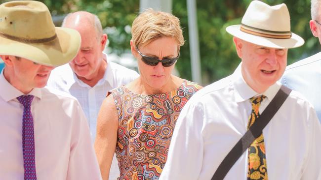 Former Children's Commissioner Colleen Gwynne, flanked by her legal team going into Darwin Magistrates Court. Picture: Glenn Campbell