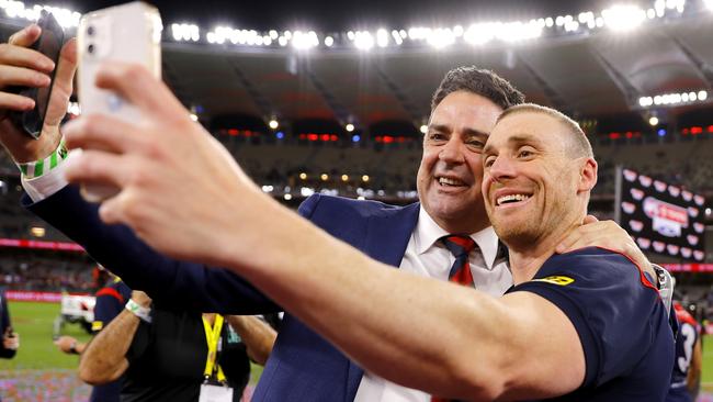 Garry Lyon takes a premiership selfie with Demons coach Simon Goodwin.