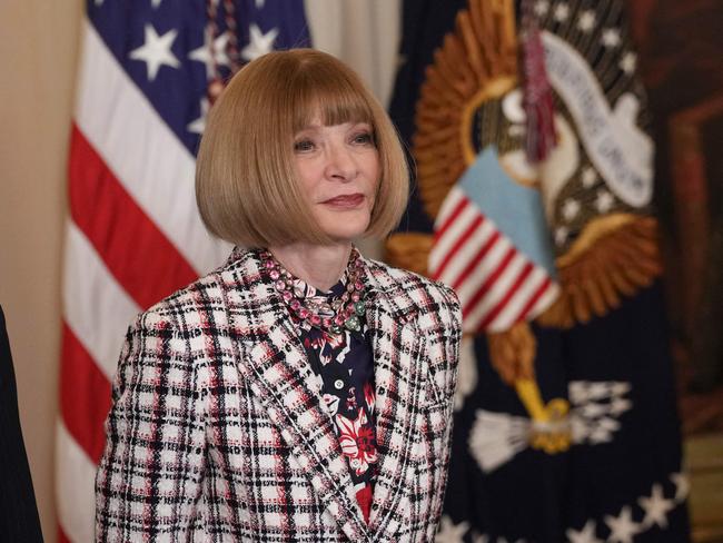 Voguie legend Anna Wintour awaits her turn to receive her Medal of Freedom. Picture: AFP