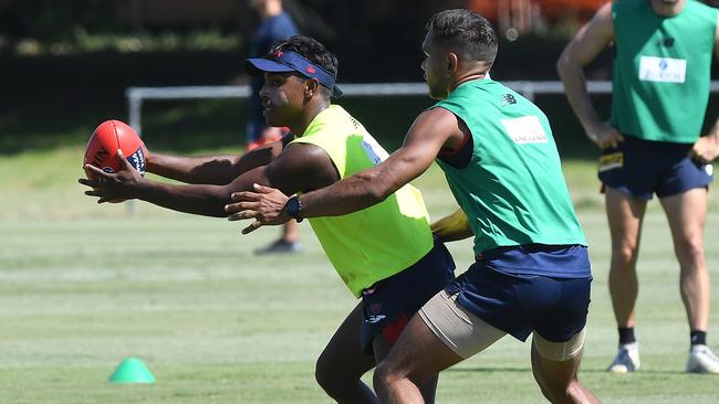 Top-pick Kysaiah Pickett, left, is a Round 1 chance for the Demons.