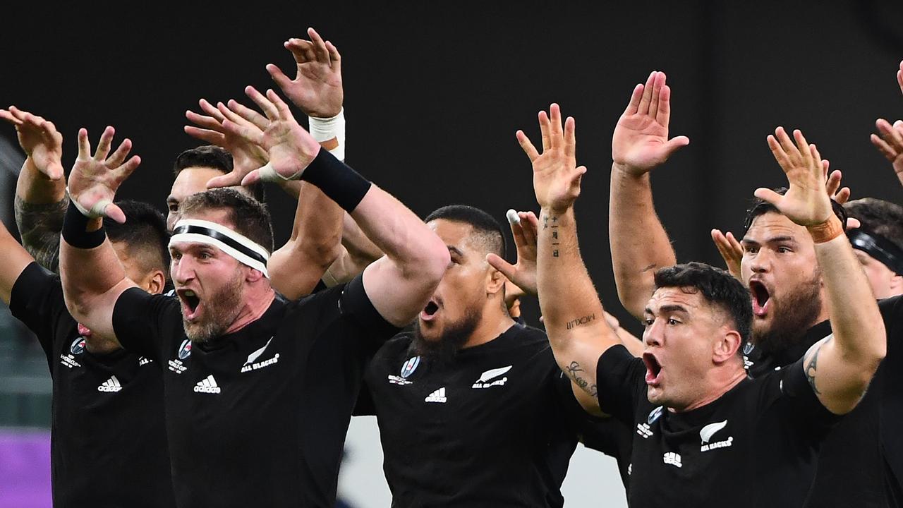 The All Blacks perform the Haka ahead of their World Cup match against Canada. (Photo by GABRIEL BOUYS / AFP)