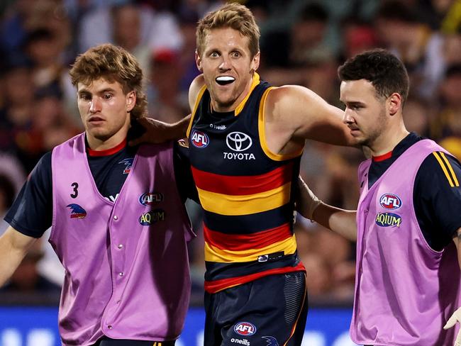 ADELAIDE, AUSTRALIA - APRIL 16: Rory Sloane of the Crows goes off injured during the 2022 AFL Round 05 match between the Adelaide Crows and the Richmond Tigers at Adelaide Oval on April 16, 2022 In Adelaide, Australia. (Photo by James Elsby/AFL Photos via Getty Images)