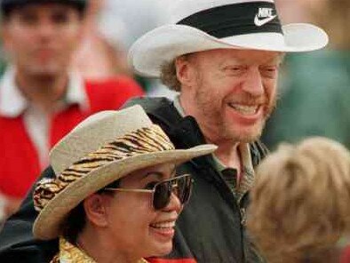 Phil Knight with Woods's mother, Kultipa, at the Masters in 1997. Picture: Reuters/The Times