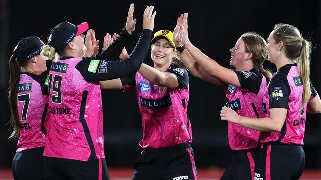 SYDNEY, AUSTRALIA - NOVEMBER 01: Courtney Sippel of the Sixers celebrates with Ellyse Perry of the Sixers and team mates after catching out Yastika Bhatia of the Stars off a delivery by Perry during the WBBL match between Sydney Sixers and Melbourne Stars at North Sydney Oval on November 01, 2024, in Sydney, Australia. (Photo by Cameron Spencer/Getty Images)