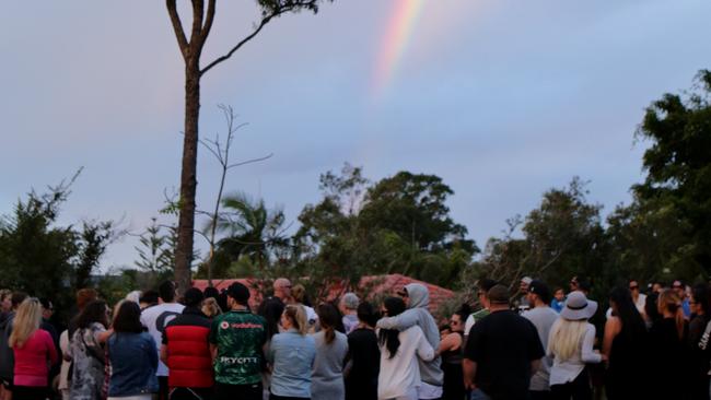 A rainbow over the scene as more than 100 friends and family turned up at the Macquarie Street scene of murder victim Tara Brown to honour and mourn her. Pics Tim Marsden