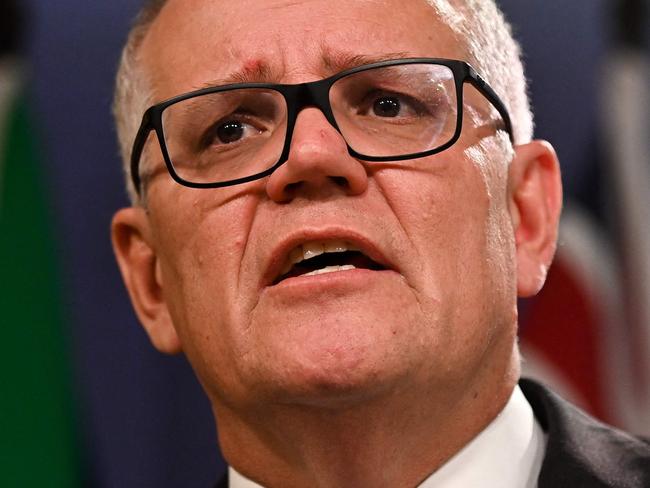 (FILES) Australia's former prime minister Scott Morrison speaks to media during a press conference in Sydney on August 17, 2022. (Photo by Steven Saphore / AFP)