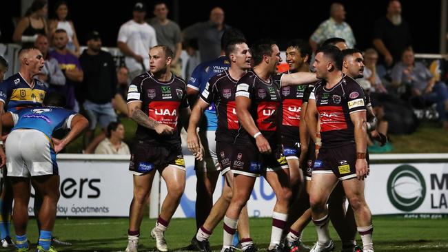 Burleigh players celebrate a try during a pre-season trial against the Gold Coast Titans at Pizzey Park. February 20, 2021. Photo Jason O'Brien