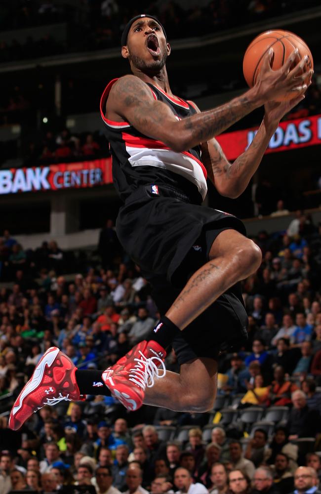 Will Barton #5 of the Portland Trail Blazers lays up a shot against the Denver Nuggets.