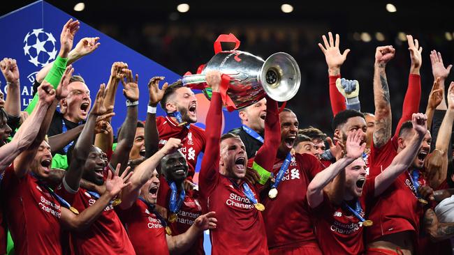 Liverpool players celebrate after winning the UEFA Champions League final football match in June. Picture: AFP