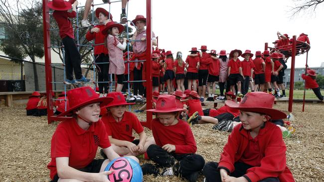 Children playing in the crowded St Kilda Park Primary School's packed playground. Picture: Richard Serong