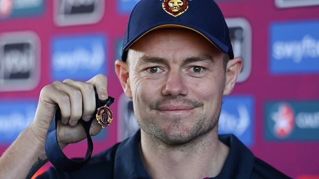 Lachie Neale poses with the Brownlow Medal during a Brisbane Lions AFL training session at Brighton Homes Arena. Picture: Albert Perez/Getty Images