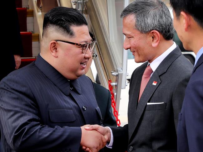 North Korean leader Kim Jong-un being welcomed by Singapore's Foreign Minister Vivian Balakrishnan. Picture: AFP