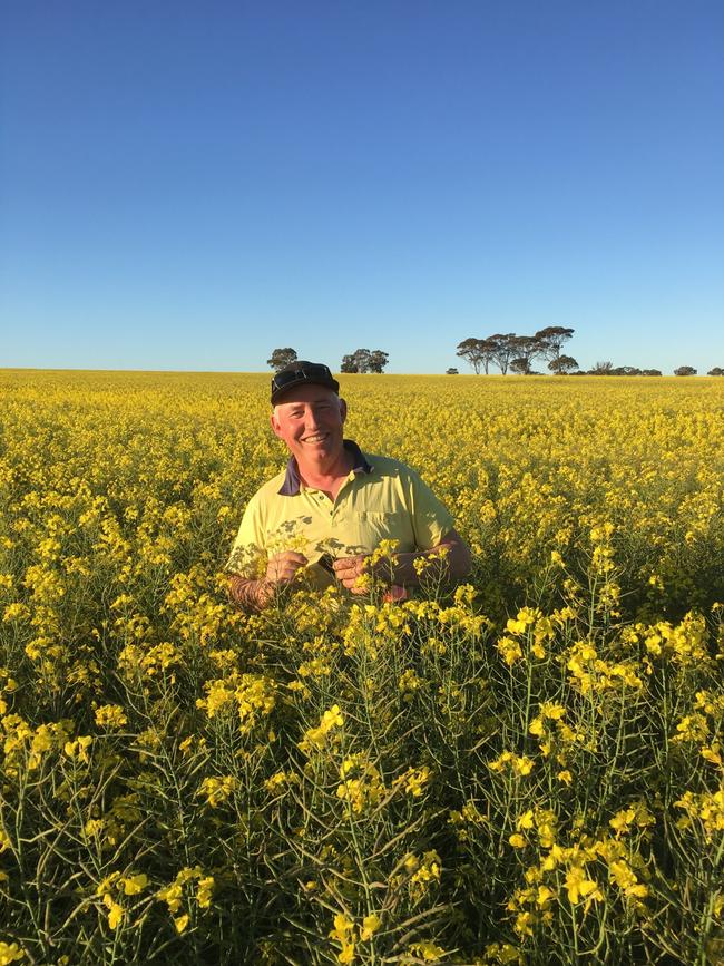 Cropping farmer and GRDC western panel chairman Gary Lang of Wickepin in Western Australia pictured in a crop of canola. Picture: Supplied