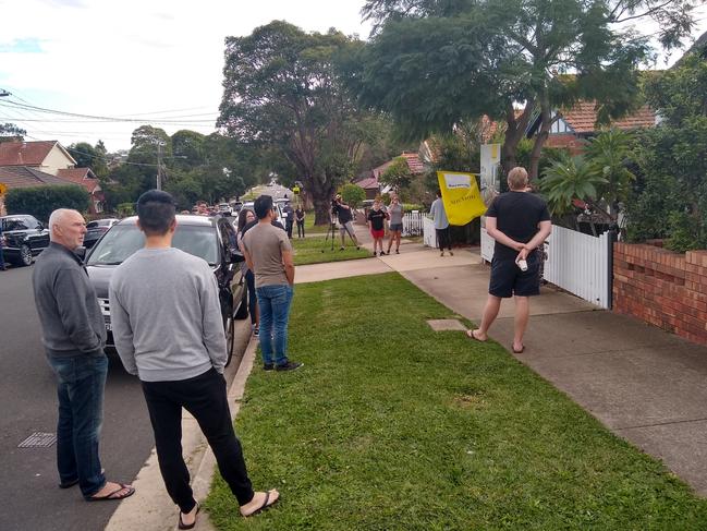 The auction of 30 Byrne St, Drummoyne, where social distancing was encouraged on the first day on-site auctions and open houses were allowed to resume. NSW real estate.