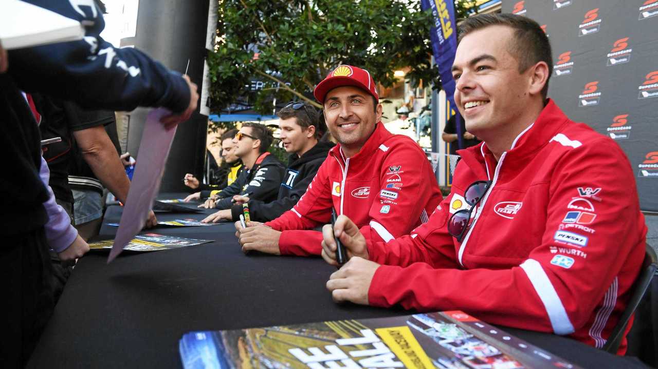 Championship leader Scott McLaughlin (right) and teammate Fabian Coulthard were happy to chat to fans at the Supercars Community Day at Orion Shopping Centre on Saturday. Picture: Rob Williams