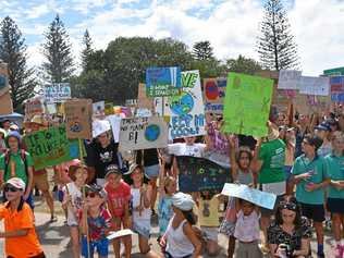 Young protesters at Peregian Beach made their message loud to stand up against climate change. Picture: Caitlin Zerafa