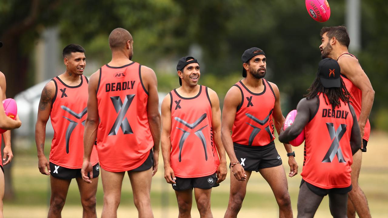 AFLX Team Deadly captain Eddie Betts and his teammates look on during the training session at Gosch's Paddock. Picture: y Scott Barbour/Getty Images)