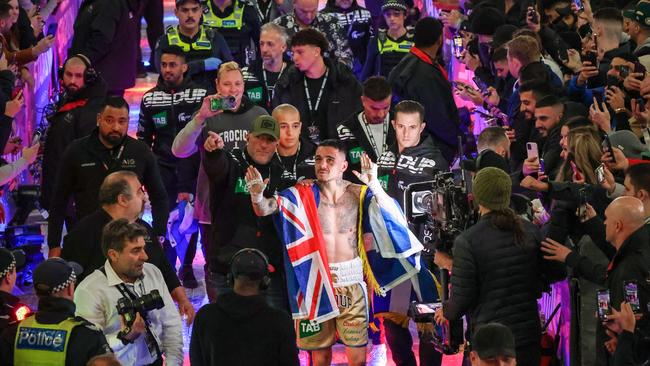 George Kambosis Jr heads back to the rooms after his loss to Devin Haney. Picture: Ian Currie