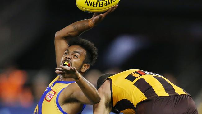 West Coast's Willie Rioli outmanoeuvres Hawthorn's Shaun Burgoyne. Picture: Michael Klein