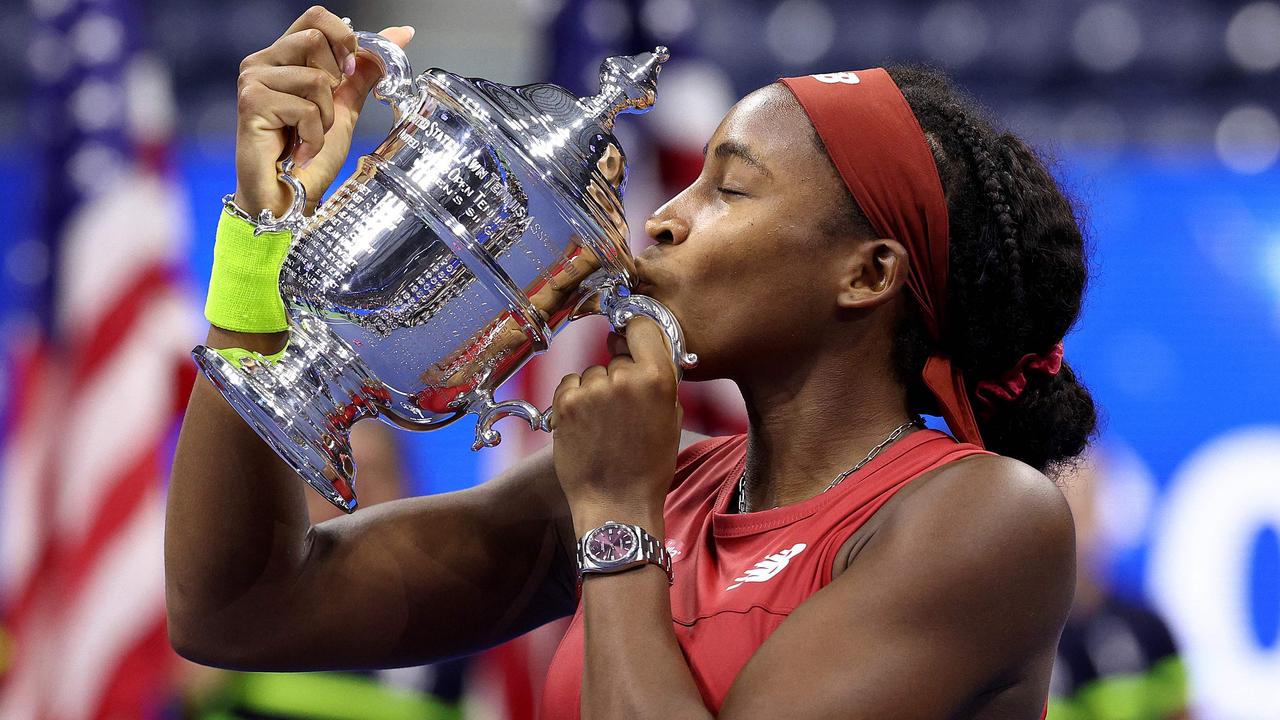 Coco Gauff enjoys that sweet championship feeling. Photo by ELSA / GETTY IMAGES NORTH AMERICA.