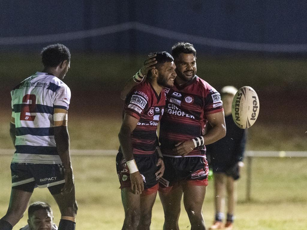 Valleys celebrate a try by Alexander Hinch (centre).