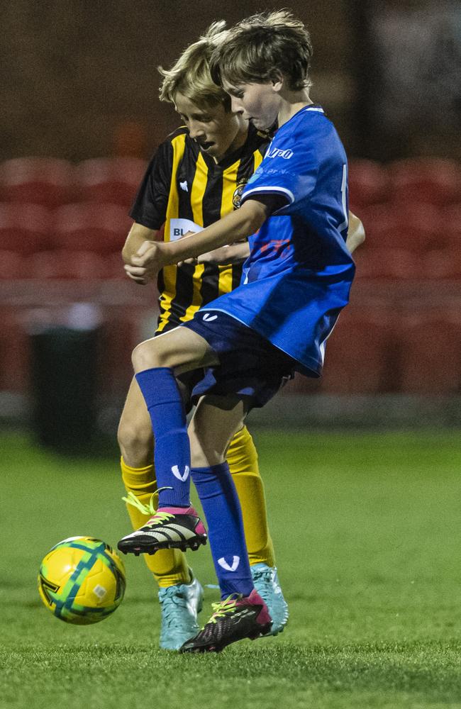 Mac Alcorn (left) of Football Dalby and Oban Pearson of Rockville Rovers Blue in Football Queensland Darling Downs Community Juniors U13 Div 1 White grand final at Clive Berghofer Stadium, Friday, August 30, 2024. Picture: Kevin Farmer