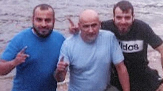 A photo of the Khayat brothers doing the Shahada gesture - which is used by ISIS - a year before their arrest. From the left, Mahmoud and Khaled Khayat and nephew Mohammed. Picture: Supplied