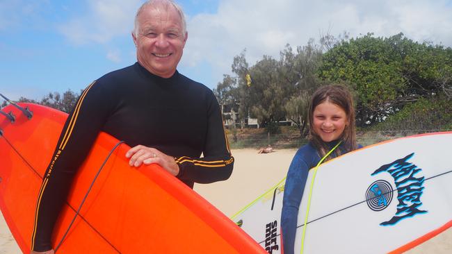 Neil Raaschou of Alex Surf Shop and Elleeah, enjoyed a morning surf at Alexandra Headland on Father's Day.