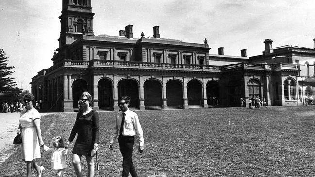 Visitors stroll across the lawn of the Chirnside mansion at Werribee Park, Melbourne, 1969.